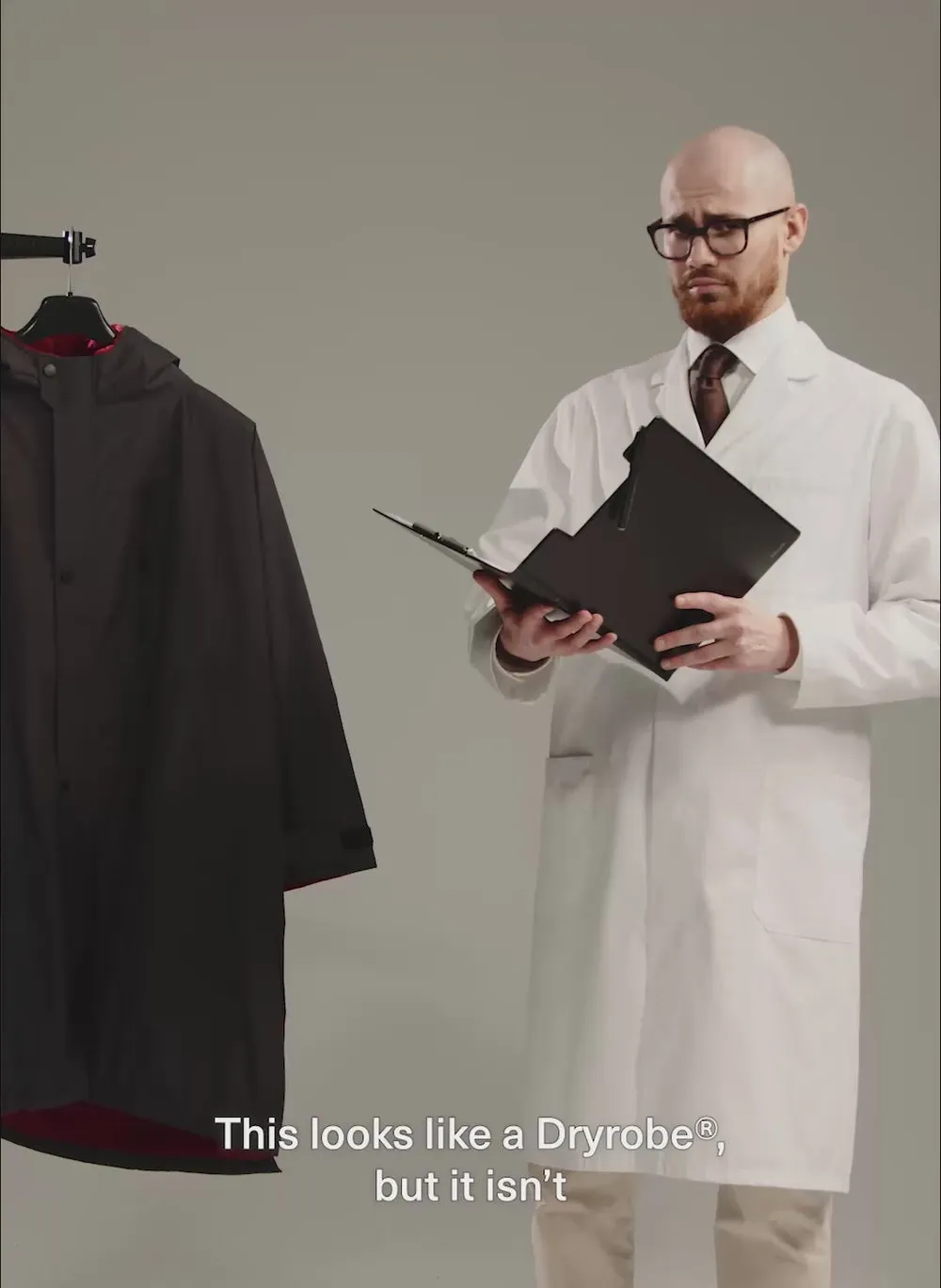 Scientist testing Dryrobe® drying time of long sleeve advance compared to competitor